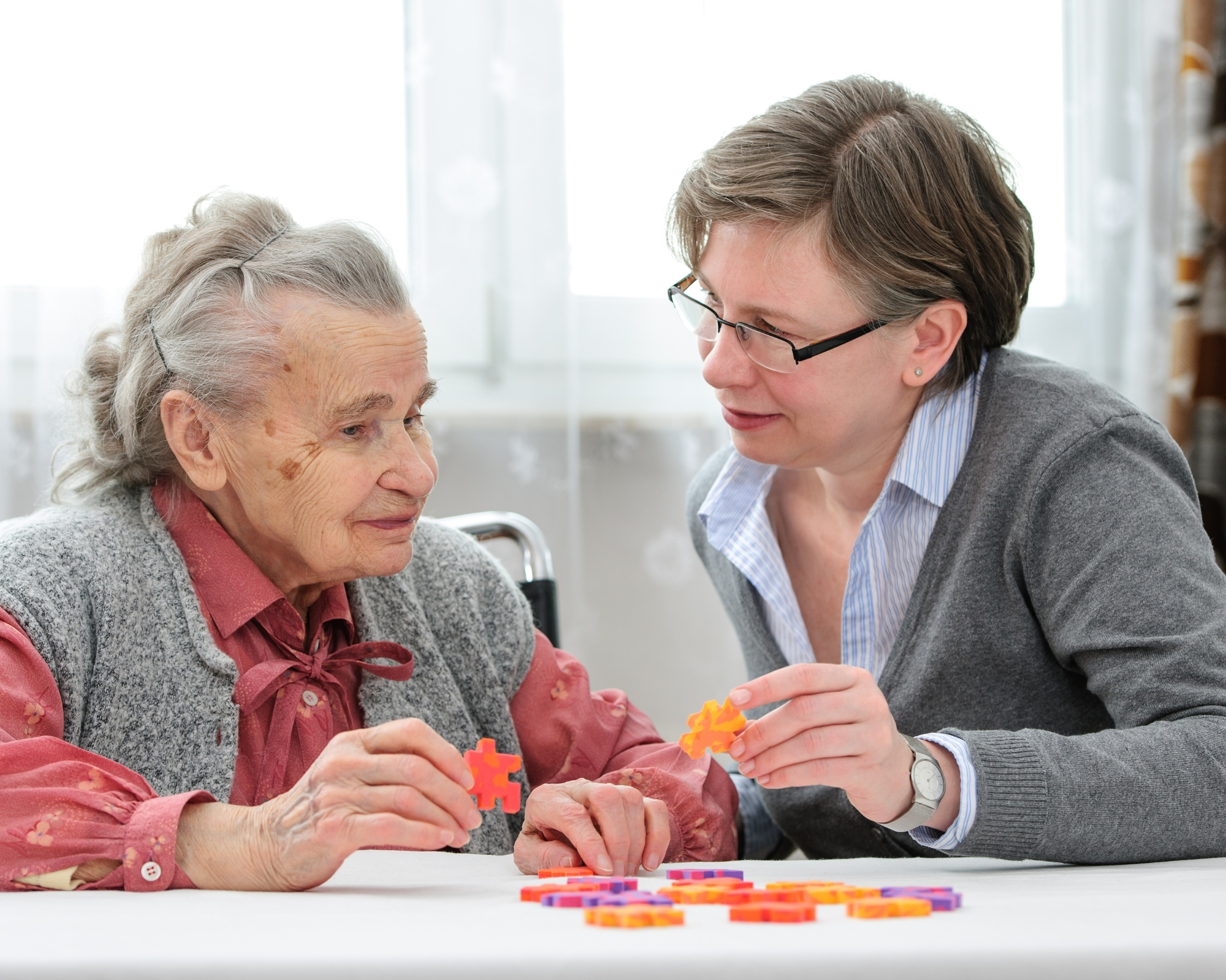 elderly mother and her daughter